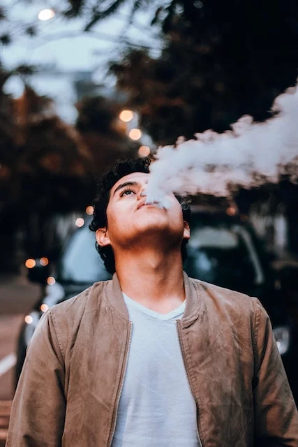 Boy Smoking | Dentist Downtown Calgary | Eau Claire Park Dental